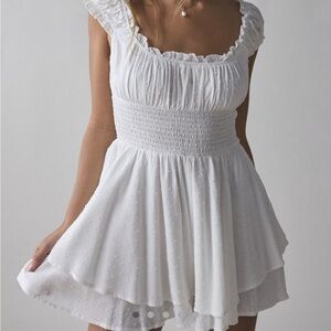 SOLD - Urban Outfitters Rosie Smocked
Tiered Ruffle Romper with/built in shorts!